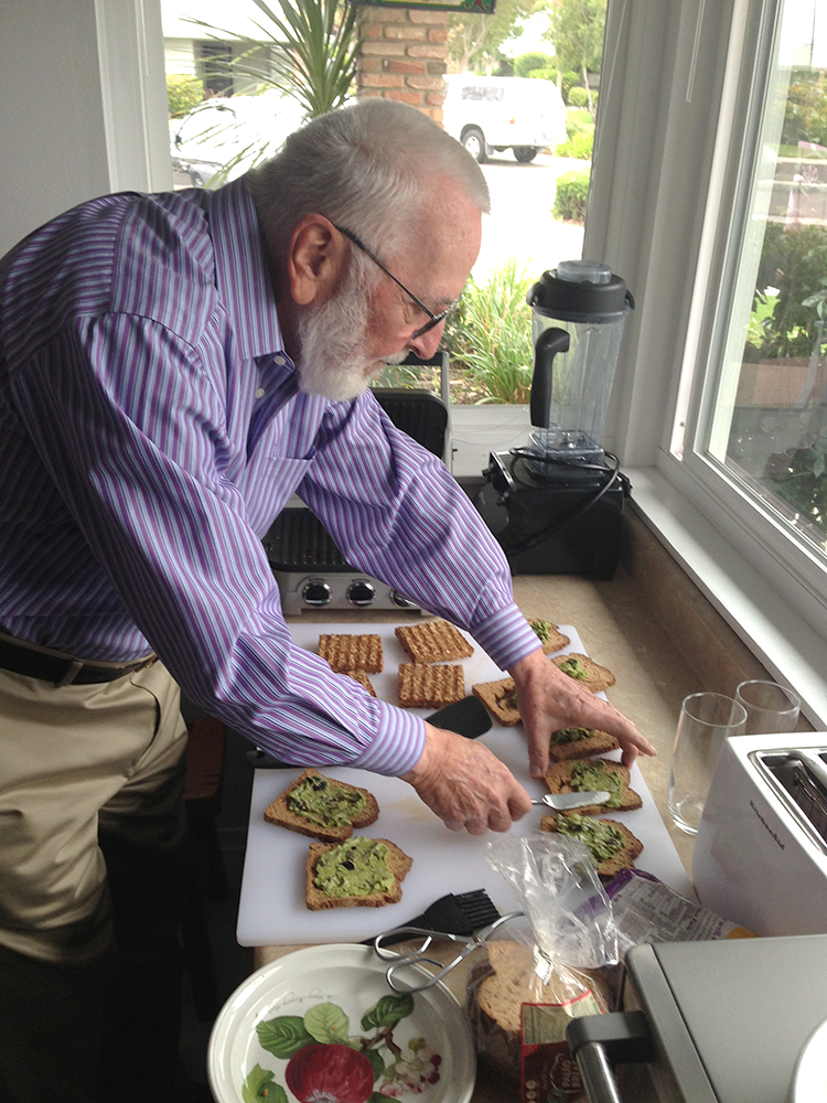 Image of Gunter Pfaff making Planit Protein tempeh sandwiches